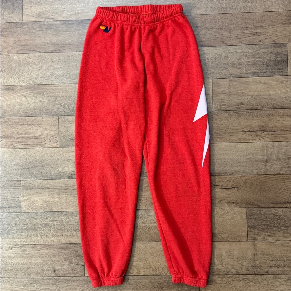 Aviator Nation Red Track Joggers with White Lightning Accent